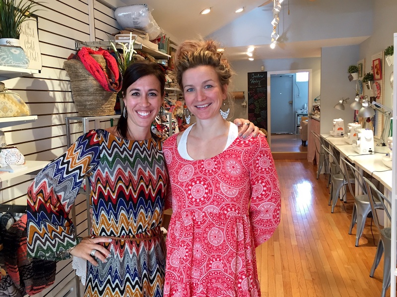 Pals and space sharers Dina Previti and Paige Sullivan. The store has six Singer sewing machines. 