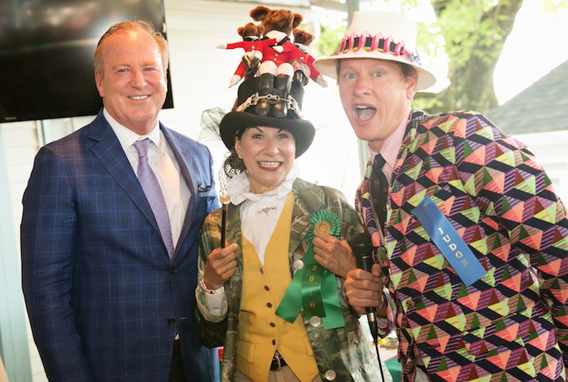 "Best of Devon" winner for her authentic equestrian ensemble, Lesley Brown enjoys her win with judges Michael Smyth of Jaguar/Land Rover Main Line and Carson Kressley. 