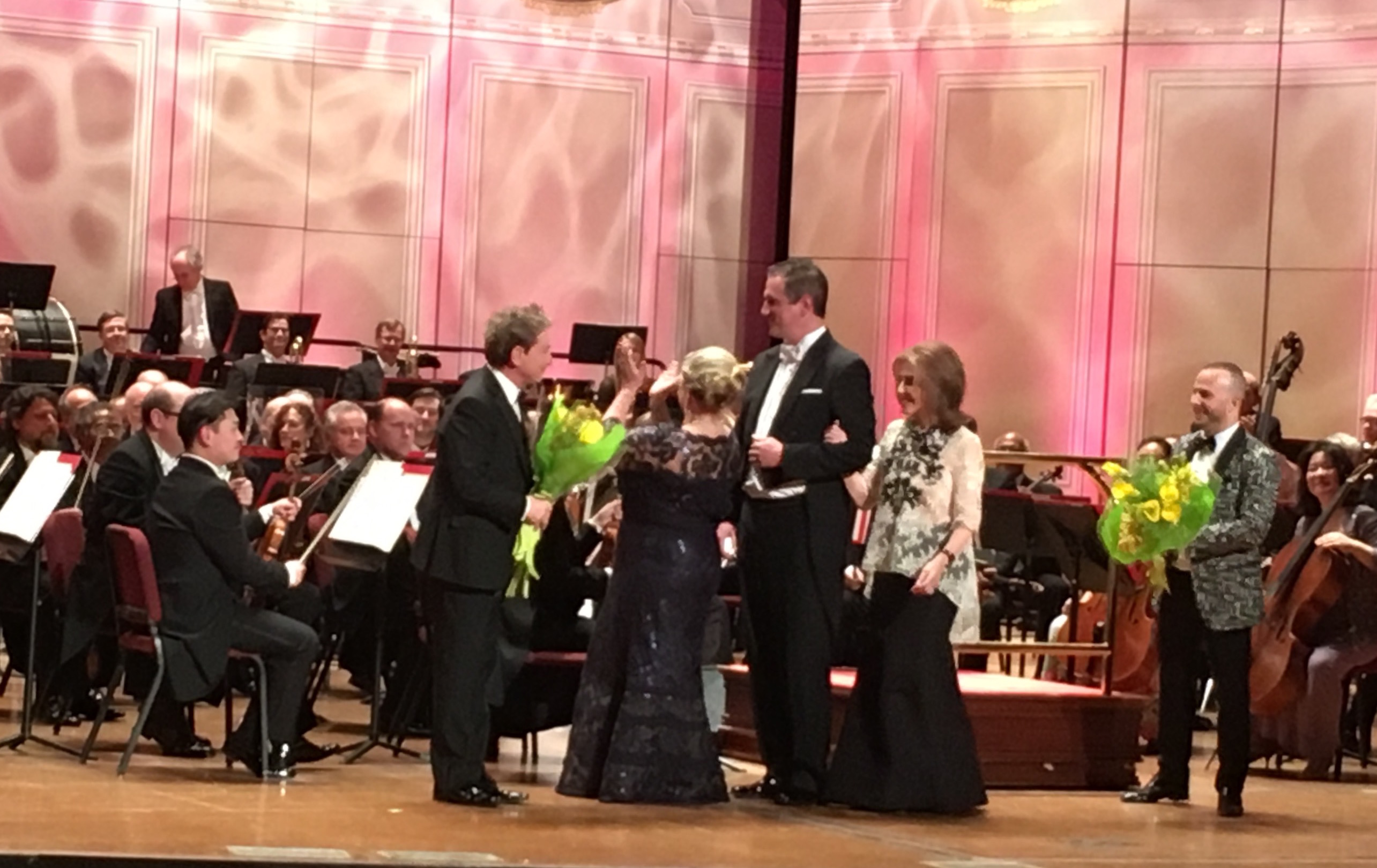 Martin Short accepts kudos and flowers from Academy Ball co-chair Georgiana Noll, and Adele Schaeffer, chair of the Academy of Music Board of Trustee, escorted by a member of the Young Friends Committee.