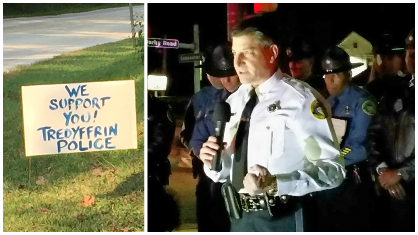 Signs supporting police and Chief Giaimo at the township's 2015 Blue Tree lighting during Police Appreciation Week. (Photo courtesy Community Matters.)